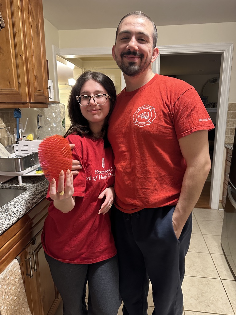 timaf and i in red posing with the morf fidget