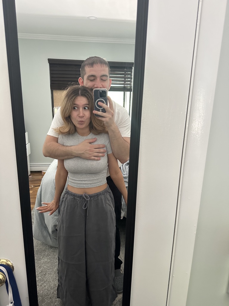 t and i posing in mirror